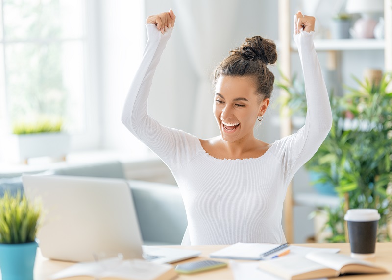 woman working on laptop at home.